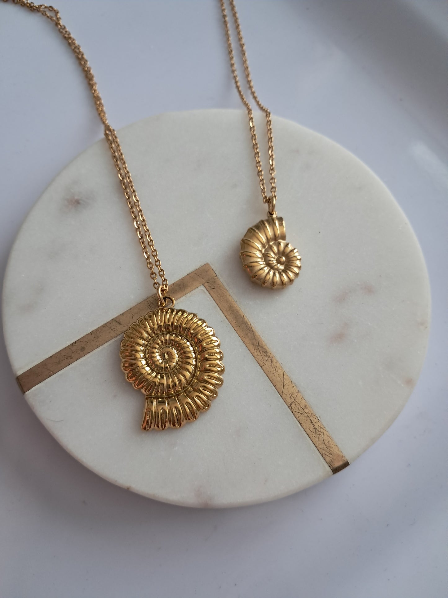 Caracol necklaces