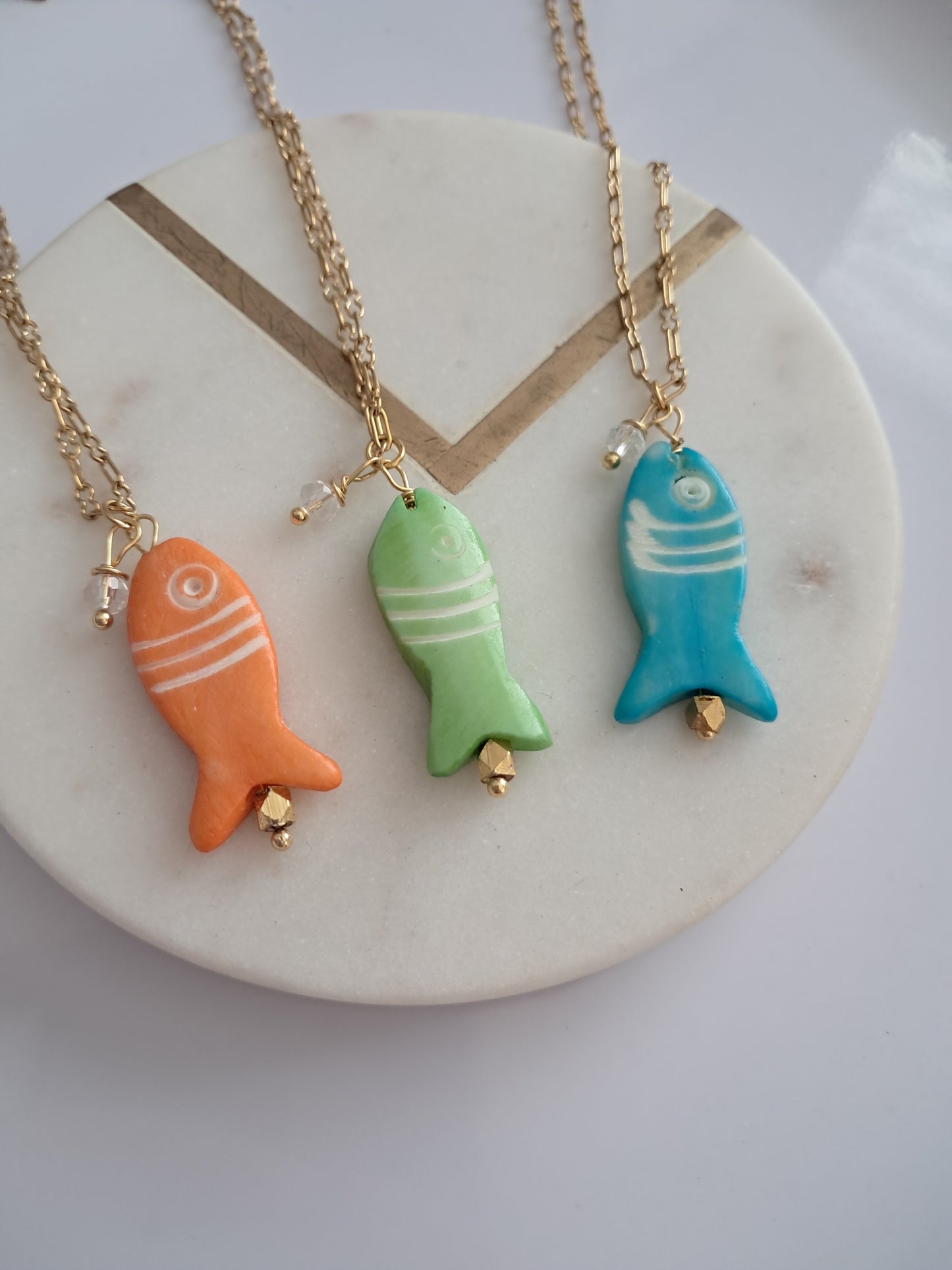 Fish Necklaces ๐