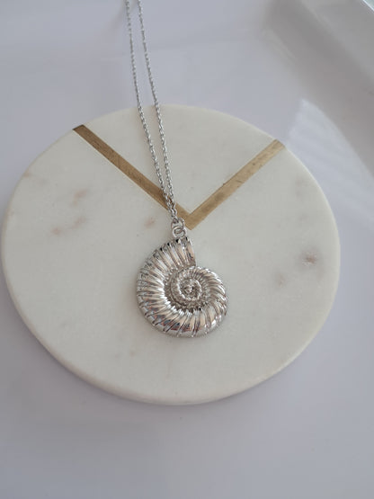 Caracol necklaces