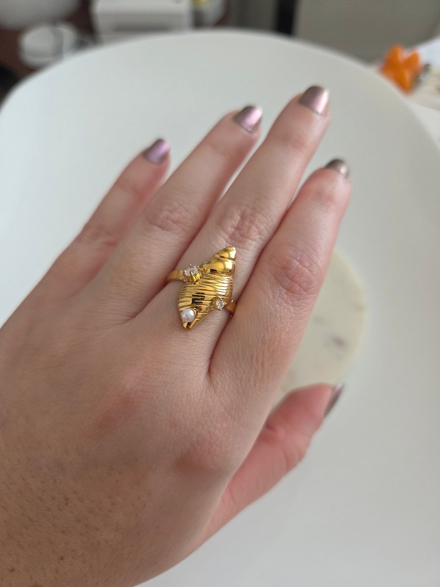 Caracol rings